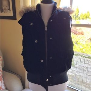 Luxury padded velvet vest with fur lined hood..